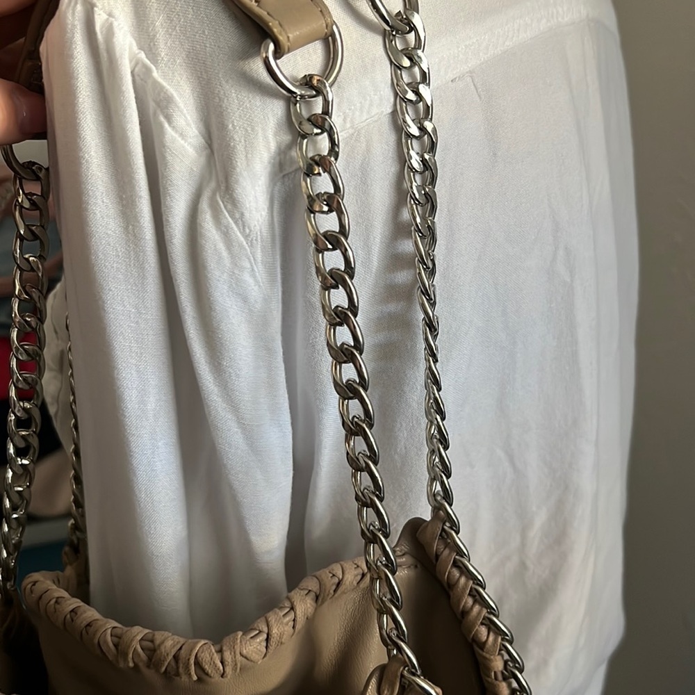 Beige leather purse with silver